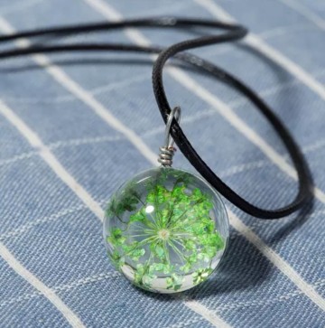 Ketting hanger bloem groen stock