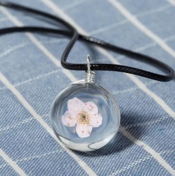 Ketting hanger bloem roze stock