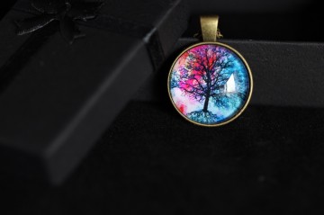 Ketting medaillon cabochon blauw roze low key