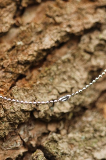 Ketting metalen ring bloem sluiting achterkant