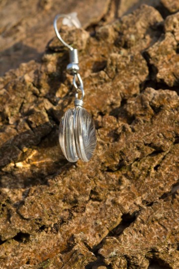 Oorbel bloem paardenbloem pluisje zijaanzicht