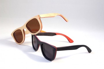 Overzicht houten zonnebril lagen blank op zwart